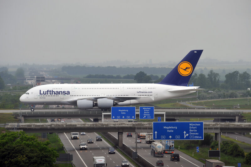 Lufthansa A380 over highway