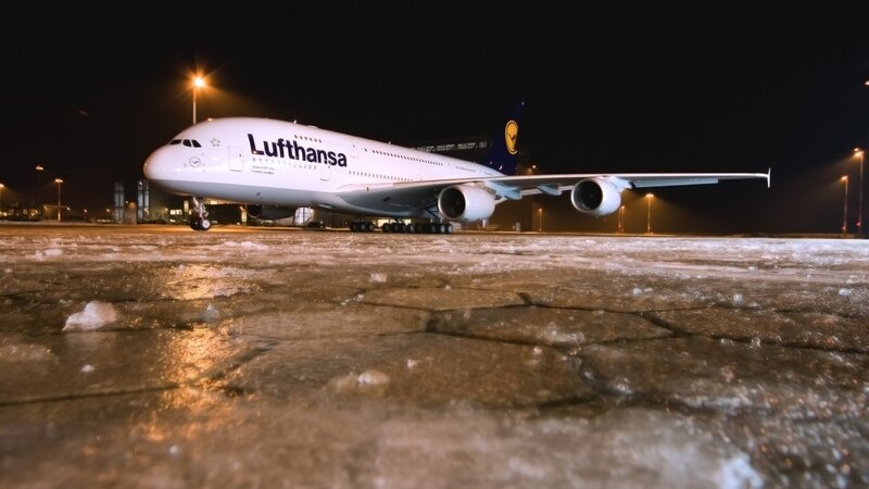 Lufthansa Airplane — White, Dramatic, Night
