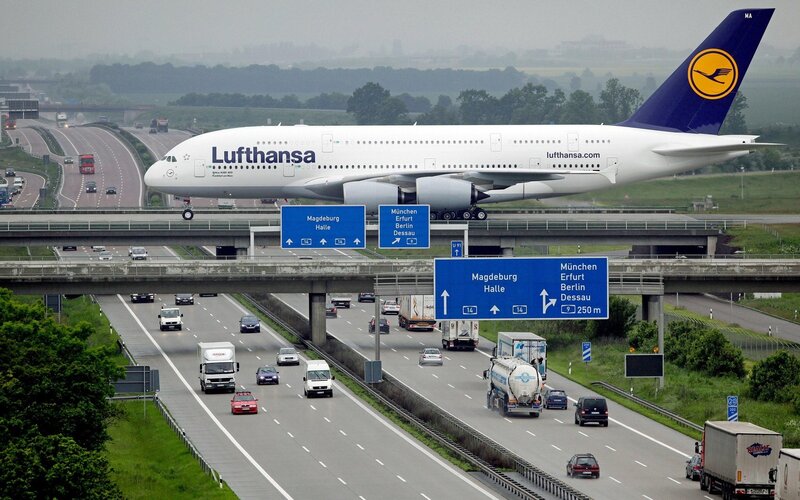 Lufthansa Airplane — White, Overcast, Photograph