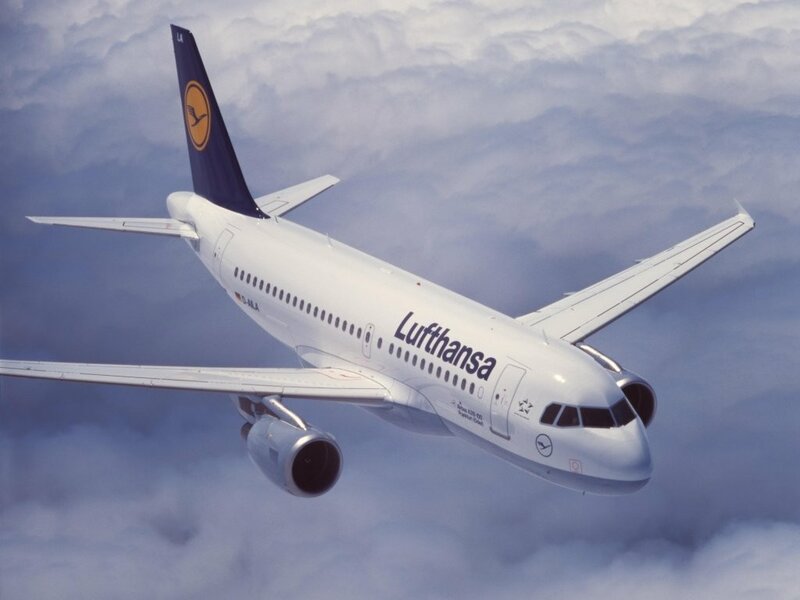Lufthansa Airplane — White, Serene, Photograph