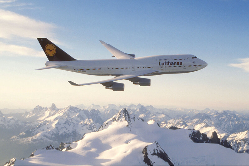 Lufthansa Boeing 747 over mountains