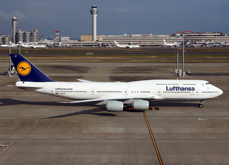 Lufthansa Boeing 747 — White, Calm, Afternoon
