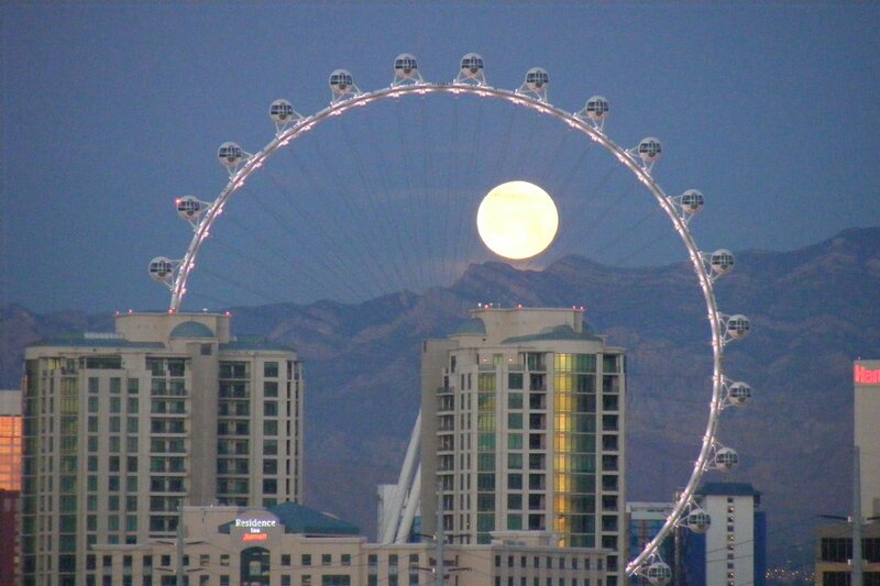 Lunar Eclipse over Ferris Wheel