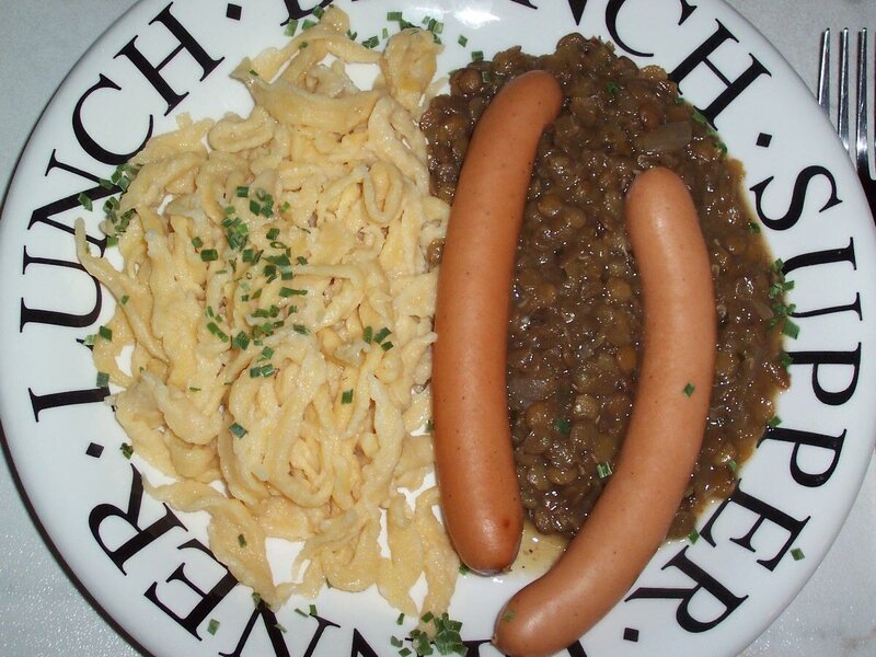 Lunch plate with sausages and noodles