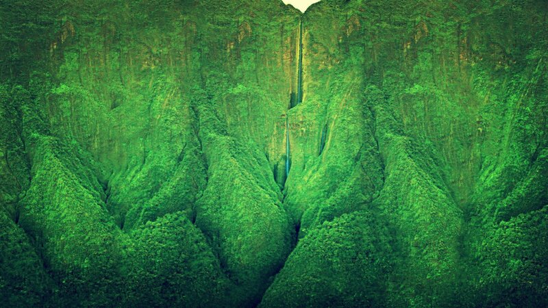 lush green canyon with waterfall