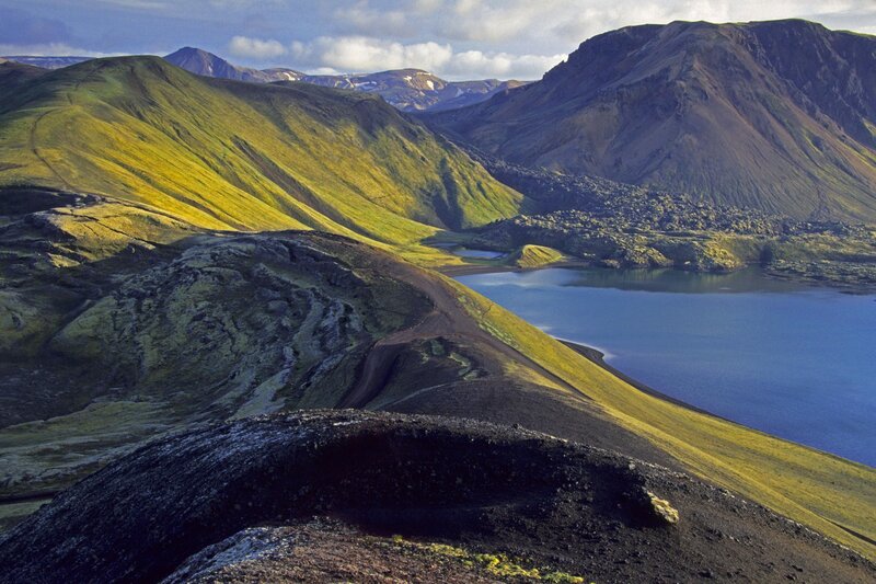 Lush green hills and lake