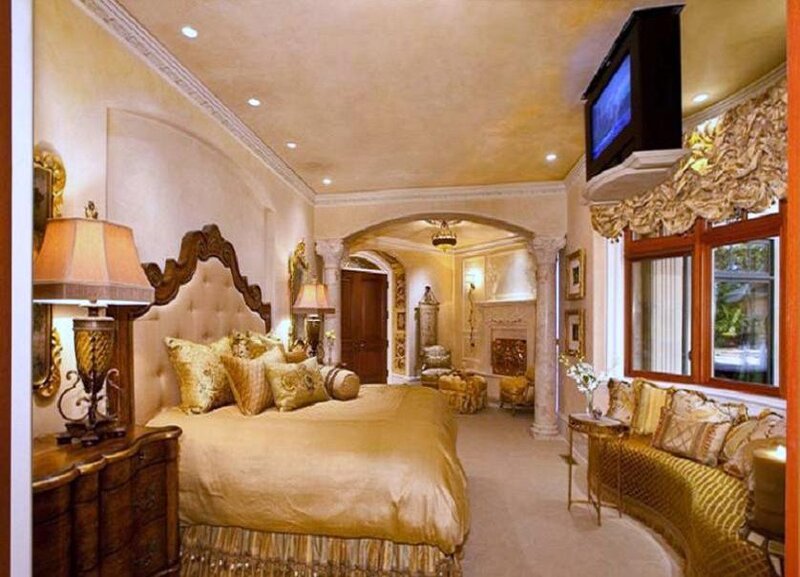 luxurious bedroom with gold accents