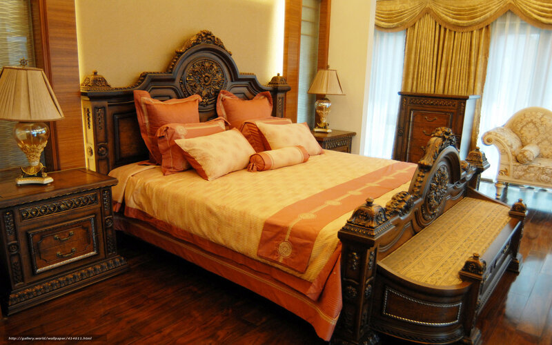 luxurious bedroom with ornate furniture
