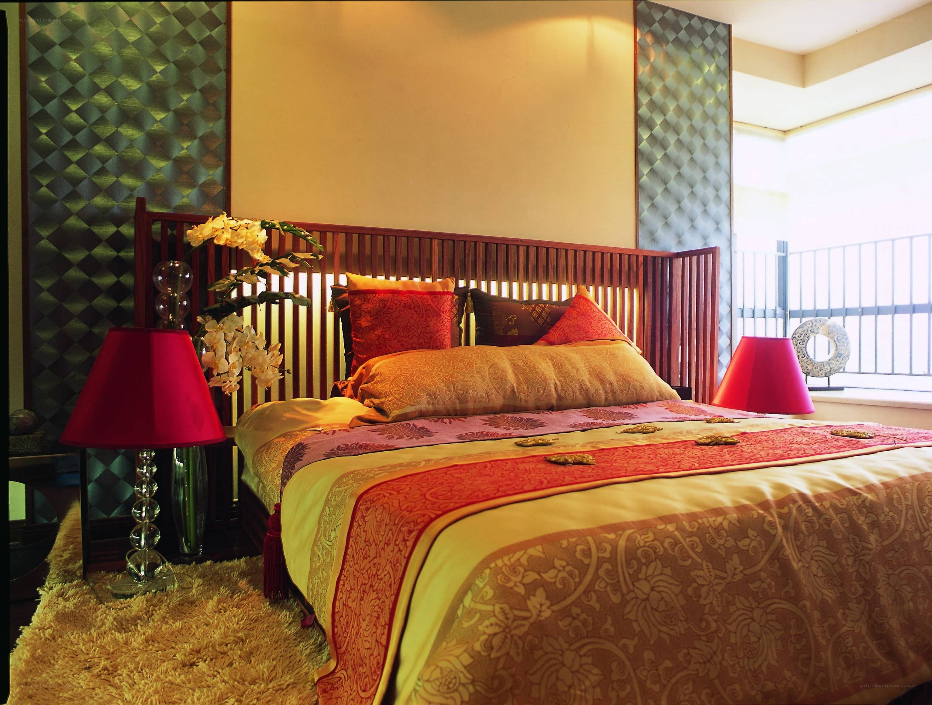 luxurious bedroom with red accents