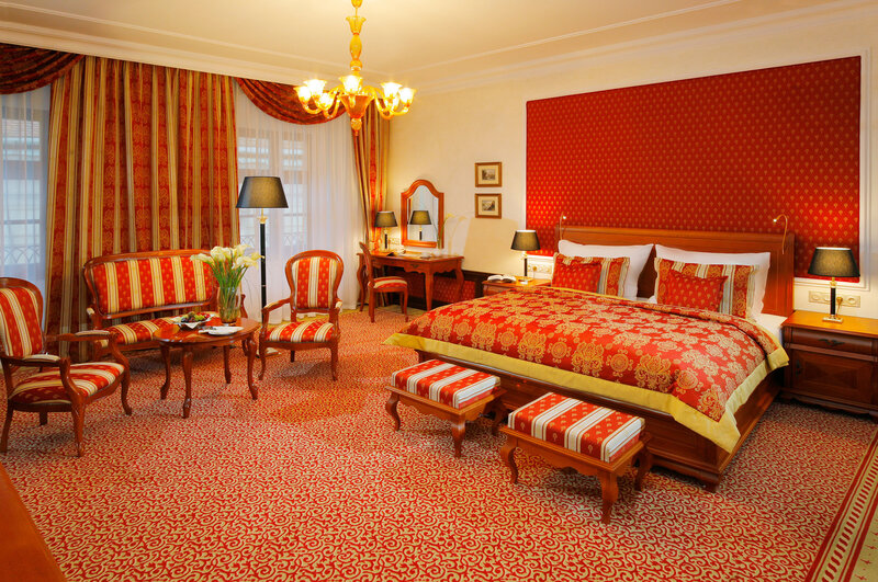 Luxurious red-themed hotel room
