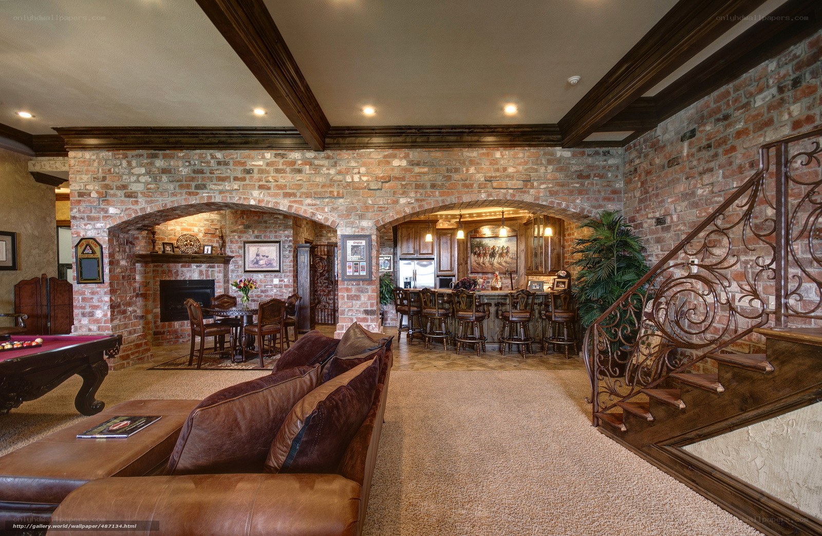 Luxury basement with pool table and bar