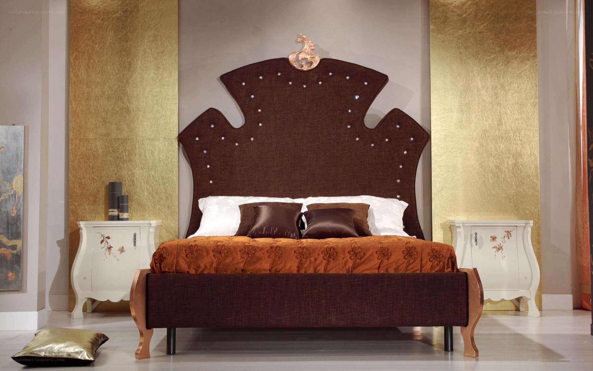 luxury bedroom with ornate headboard