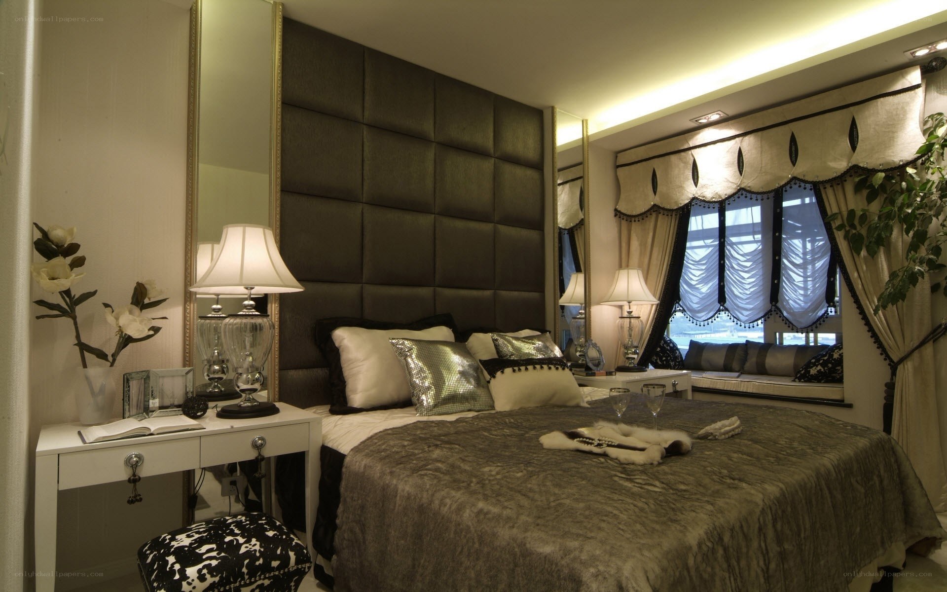 luxury bedroom with tufted headboard