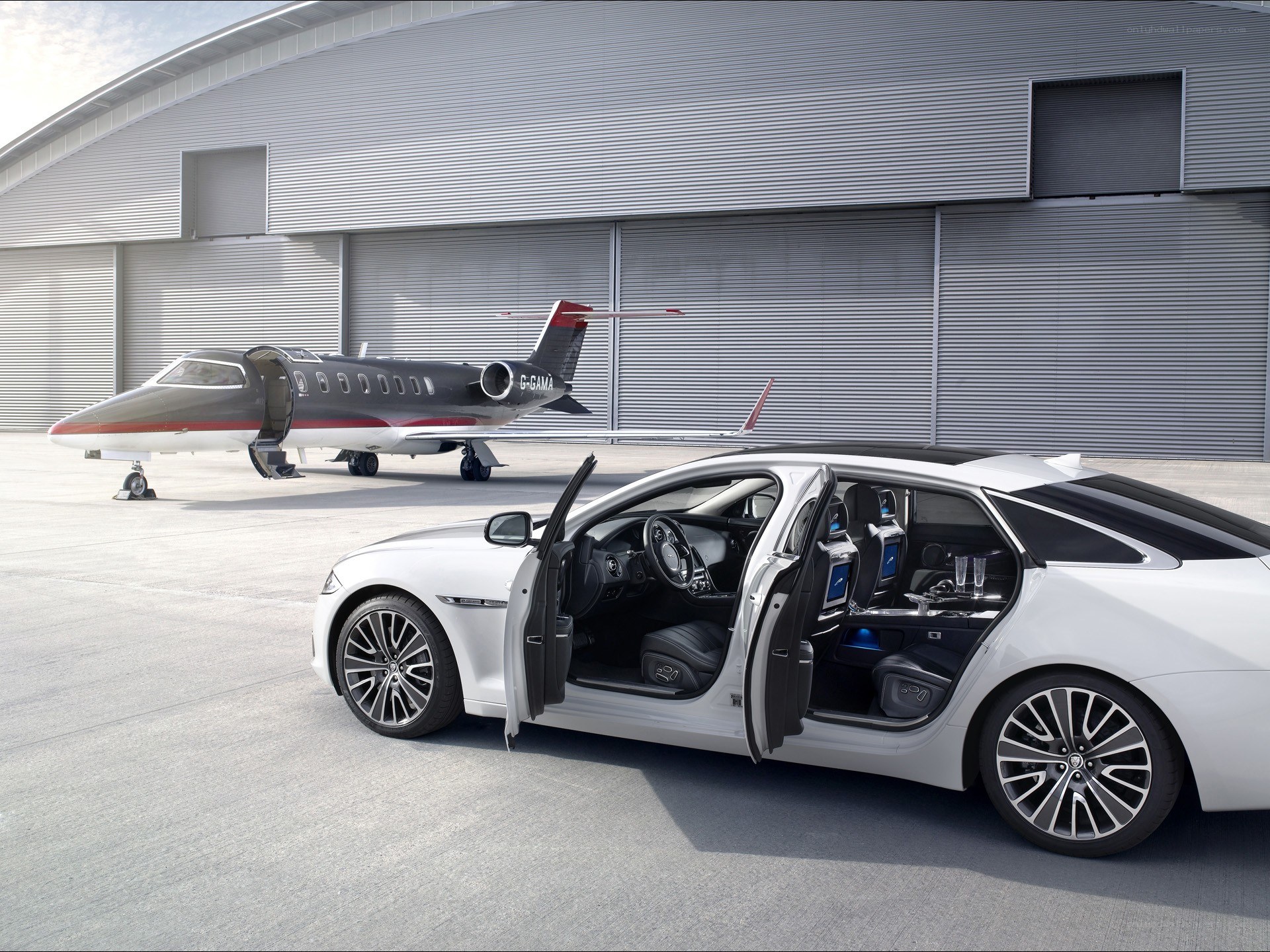 Luxury car and private jet