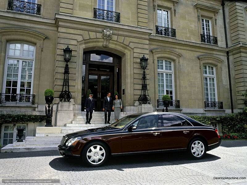 Luxury car at grand hotel entrance