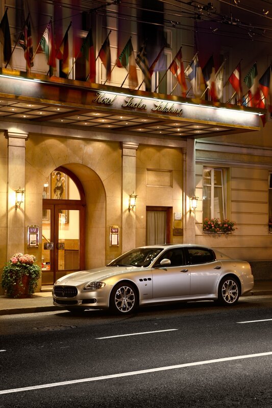 Luxury car at hotel entrance