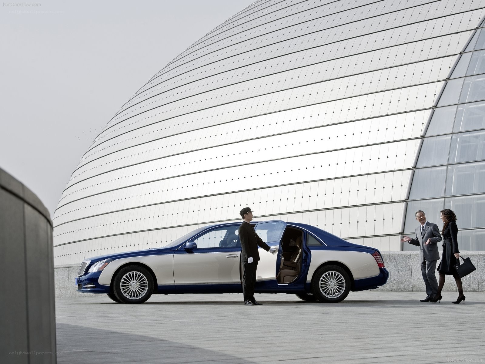 Luxury car at modern building