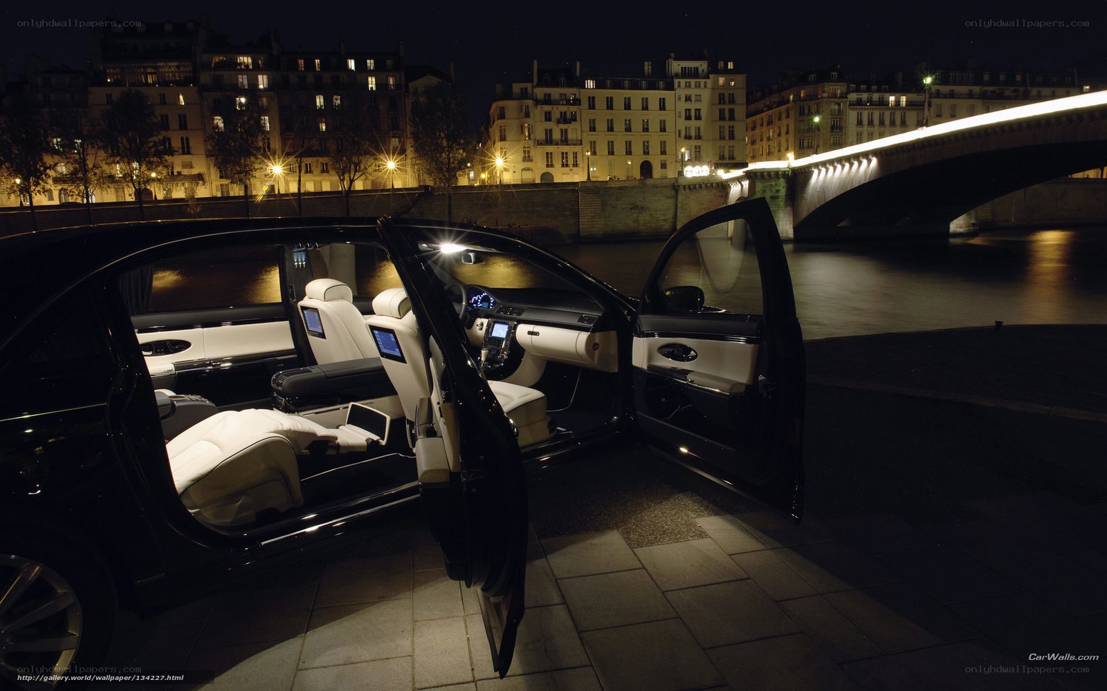 Luxury car at night by the river