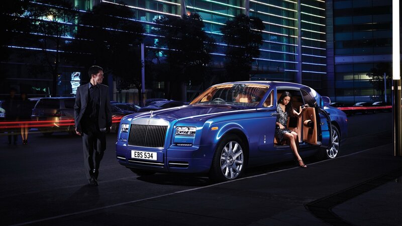 Luxury car at night with passengers