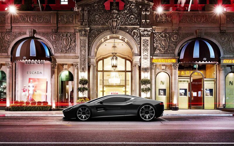 Luxury car in front of upscale shops