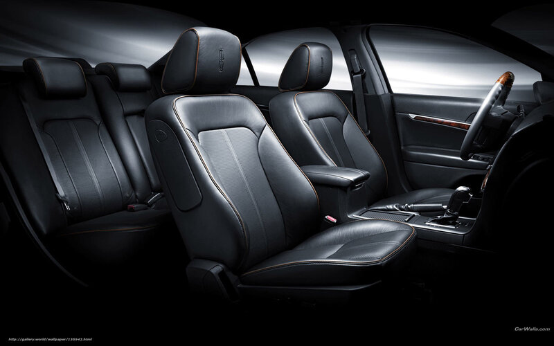 Luxury car interior with black leather seats