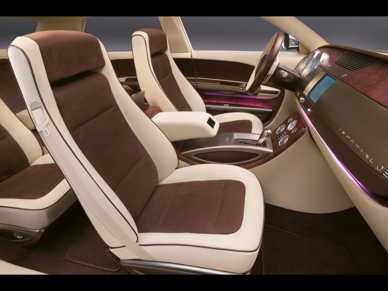 luxury car interior with brown and cream seats