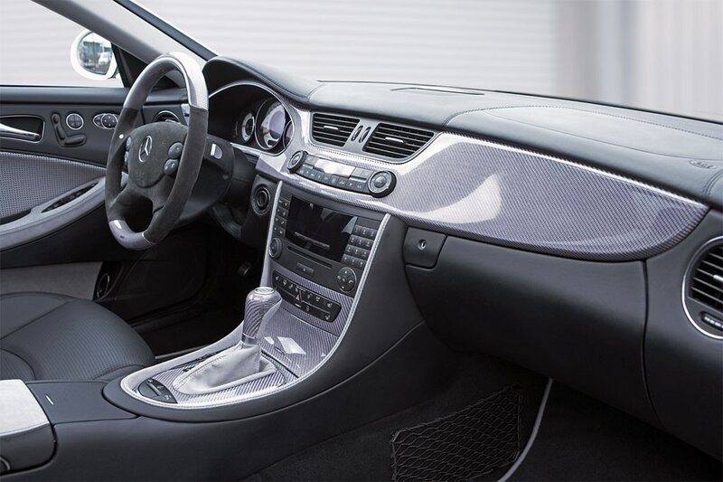 luxury car interior with carbon fiber