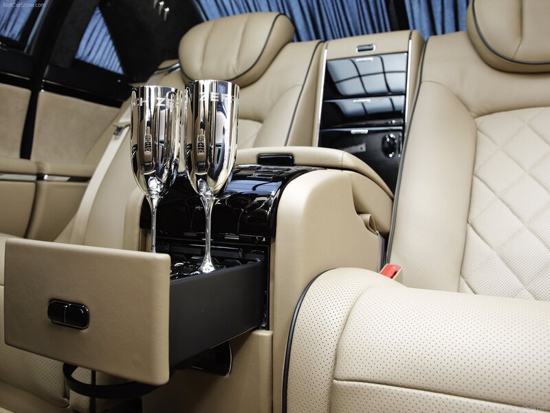 Luxury car interior with champagne flutes