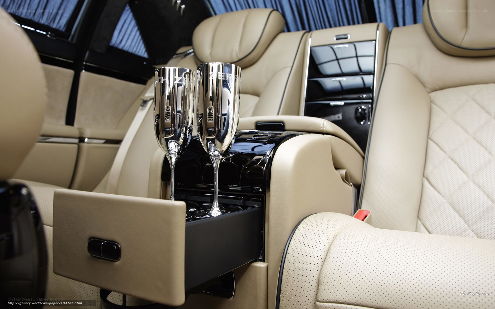 Luxury car interior with champagne flutes