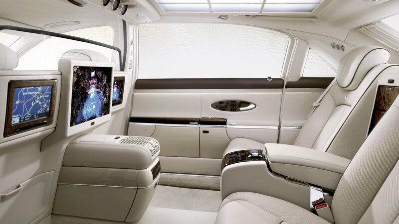 luxury car interior with entertainment screens
