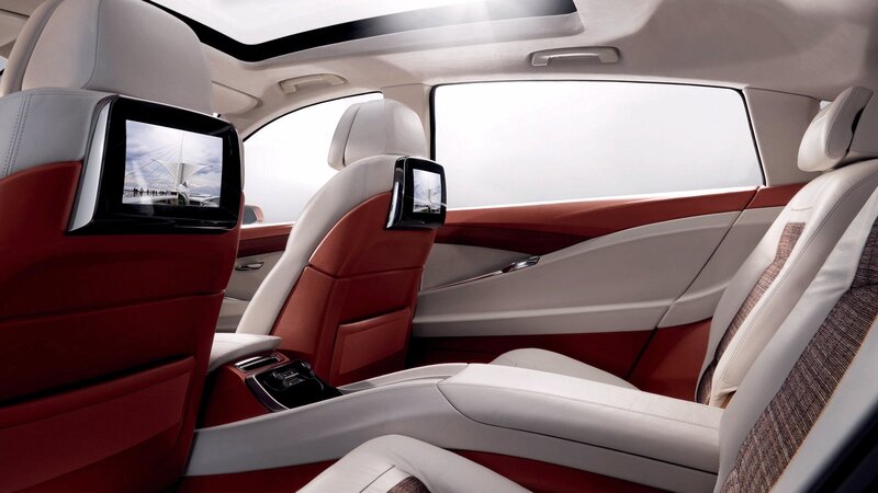luxury car interior with entertainment screens