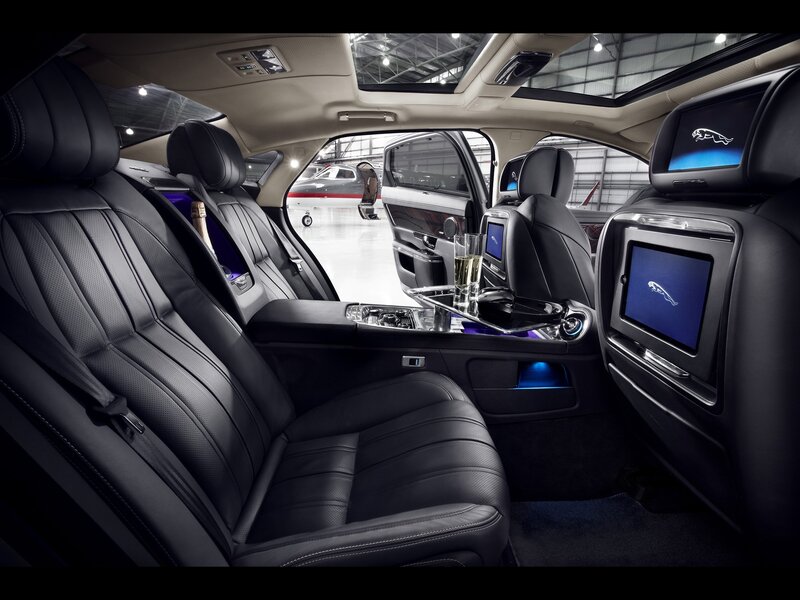 luxury car interior with entertainment screens