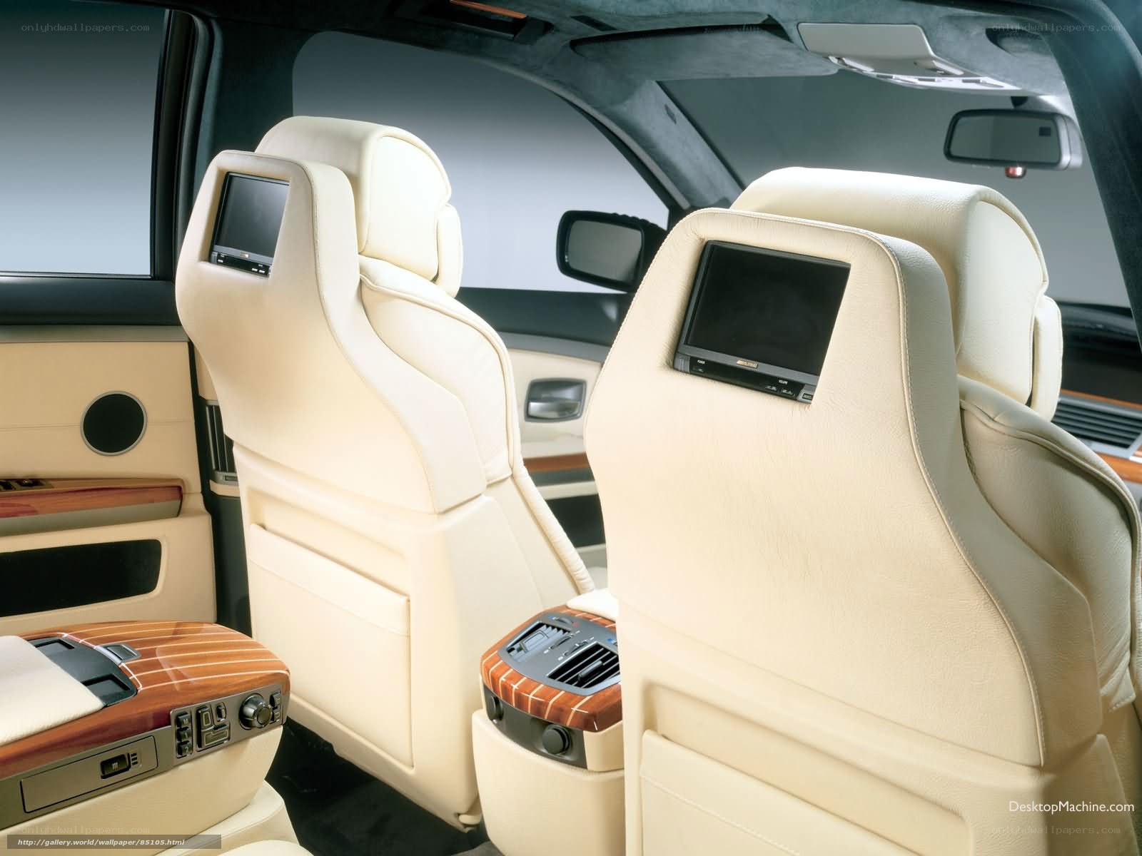 luxury car interior with entertainment screens