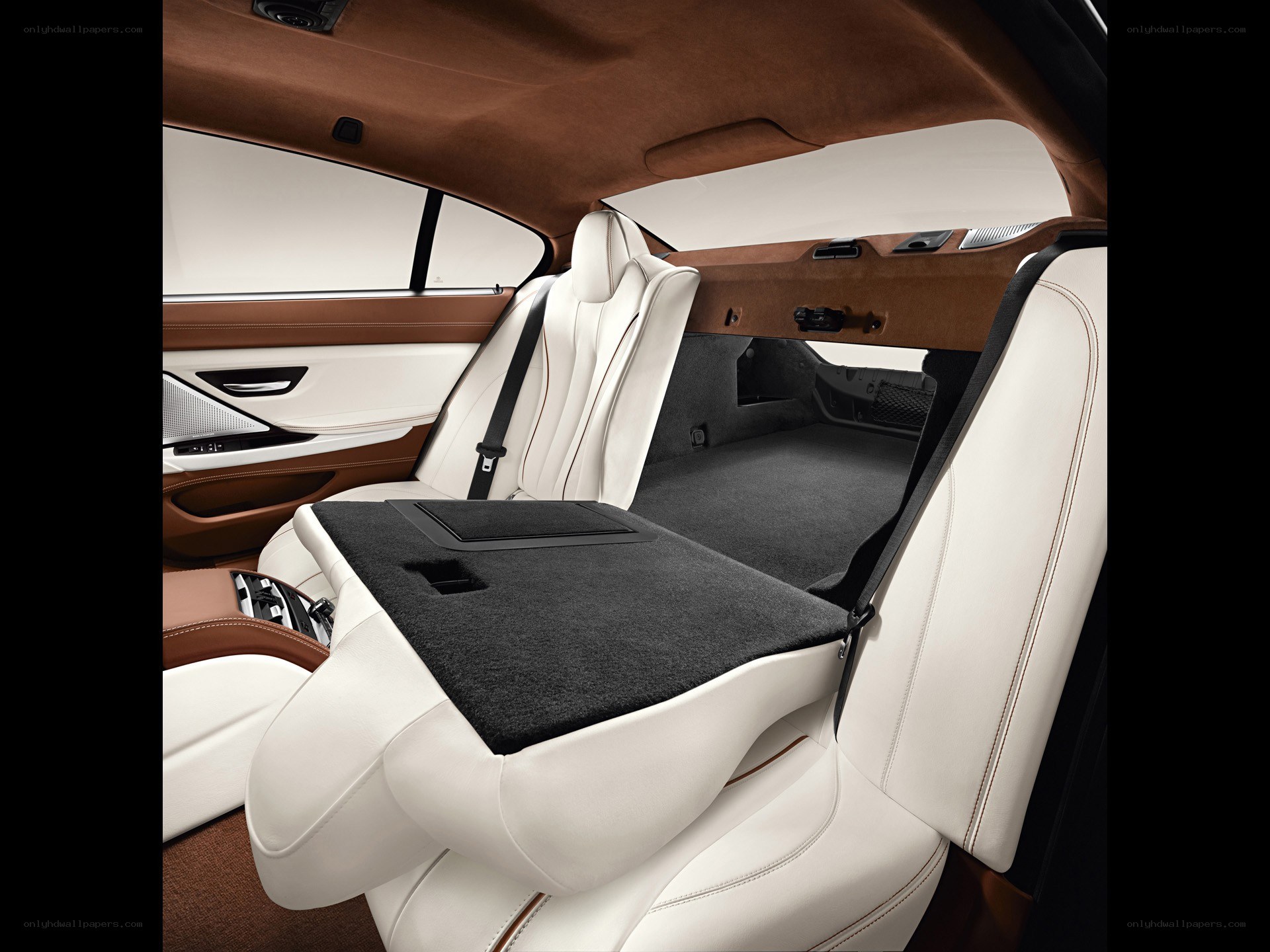 Luxury car interior with folded seats