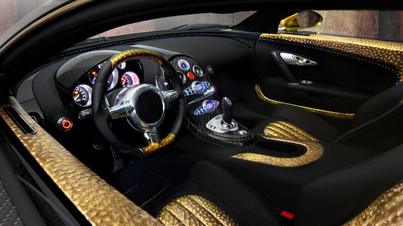 luxury car interior with gold accents
