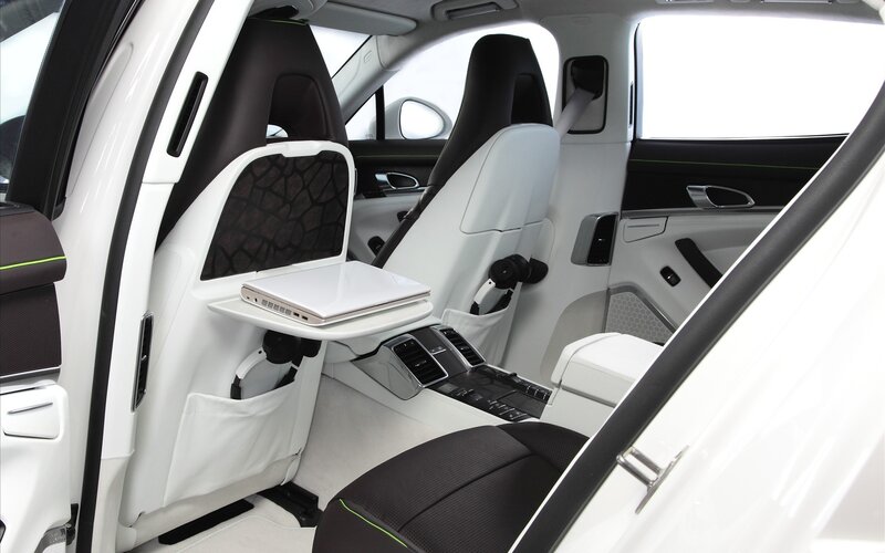 Luxury car interior with laptop tray