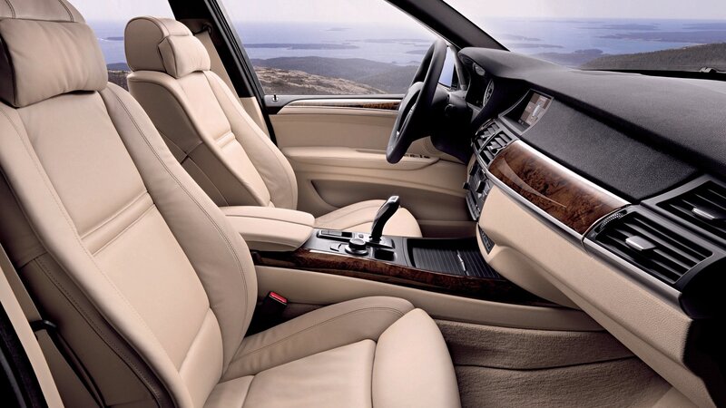 luxury car interior with ocean view