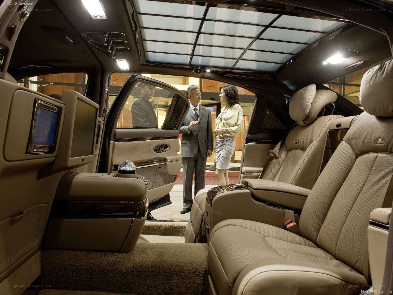 Luxury car interior with passengers