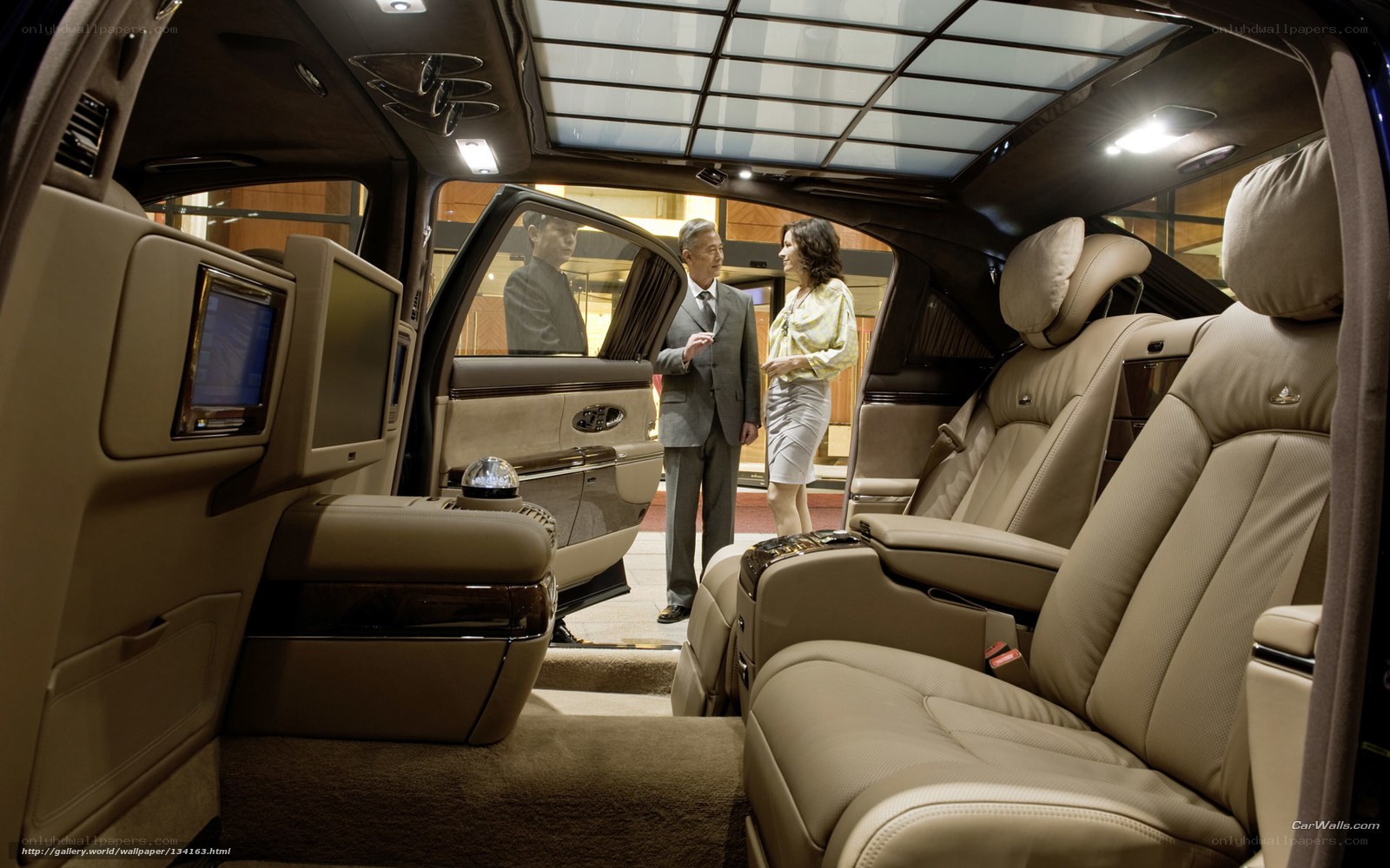 Luxury car interior with passengers