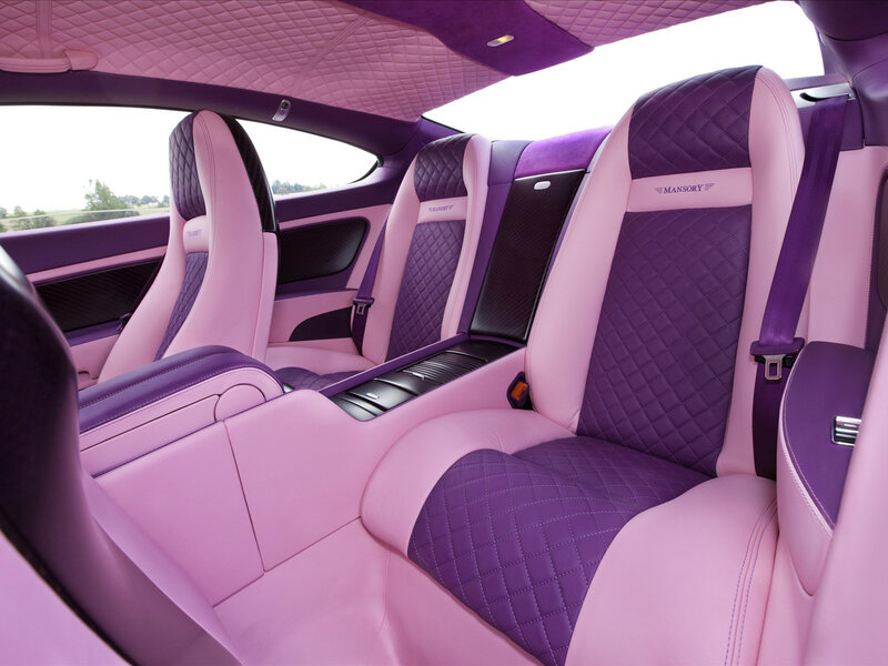 Luxury car interior with pink and purple seats