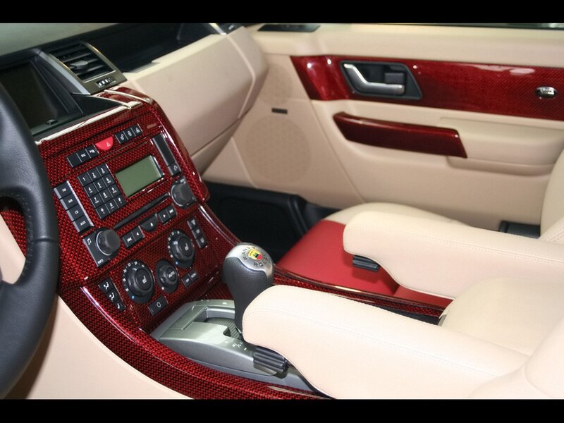 luxury car interior with red accents
