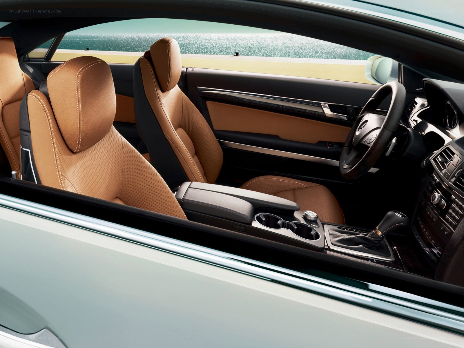Luxury car interior with tan seats