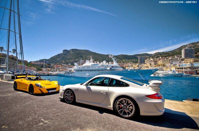Luxury cars at a marina
