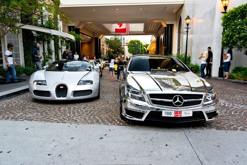 Luxury cars at hotel entrance