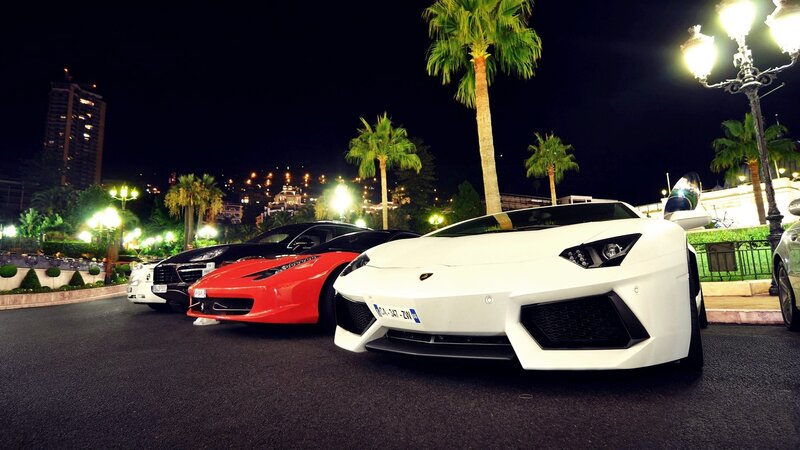 Luxury cars at night in Monaco