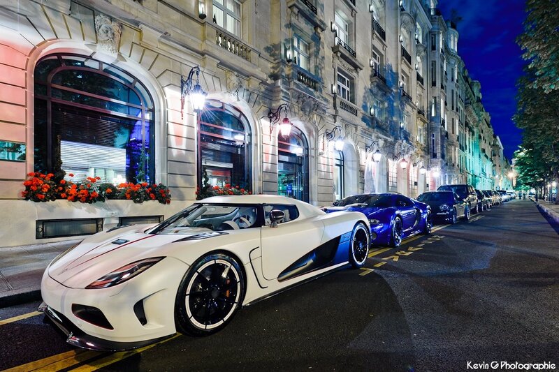Luxury cars at night in Paris