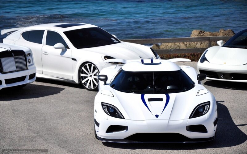 luxury cars by the sea