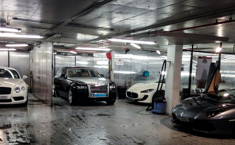 Luxury cars in a garage