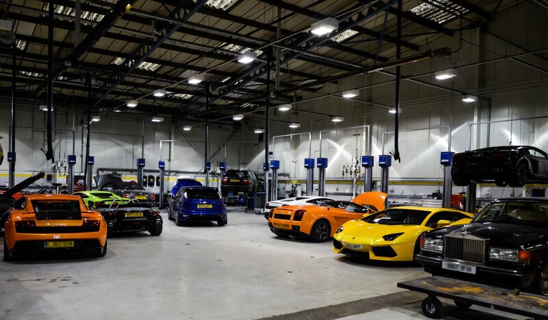 Luxury cars in a garage