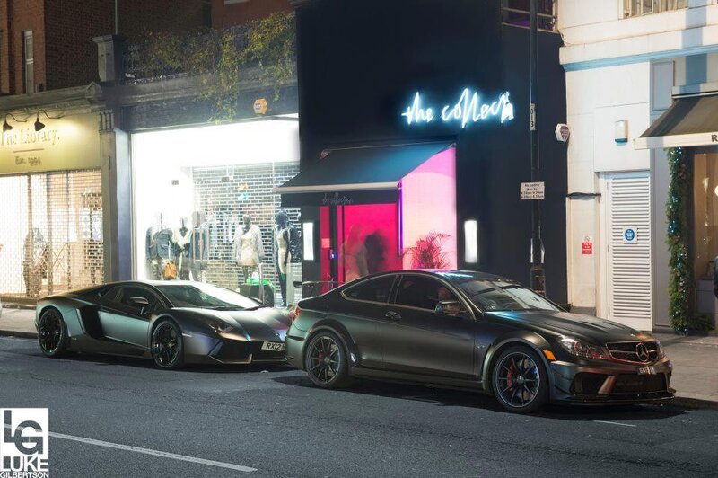 Luxury cars on a city street